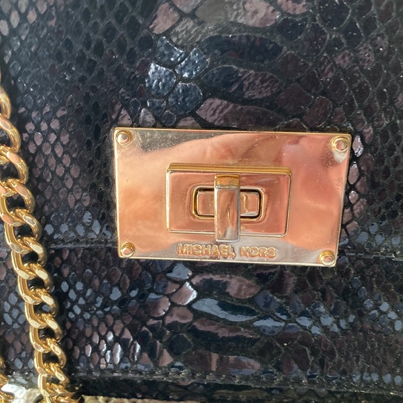 Michael Kors woman’s black embossed over the shoulder purse NWOT. Gold hardware. - Picture 3 of 7